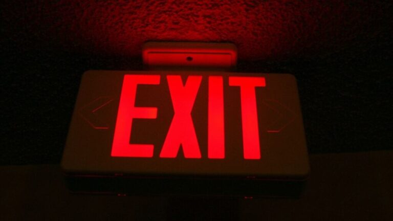 Exit sign Karl Callwood Unsplash 1024x576