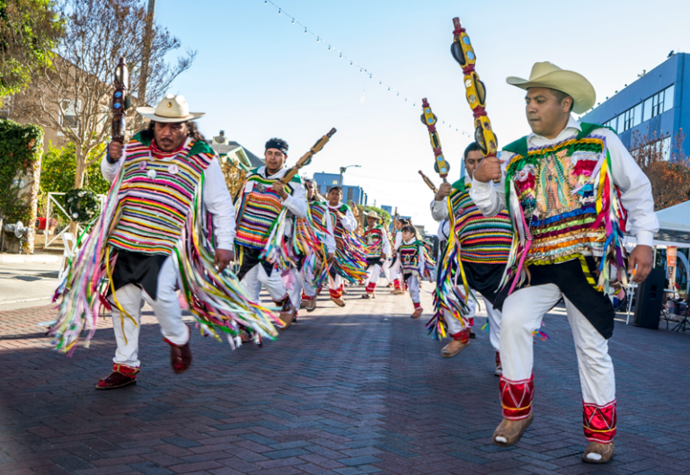 the costumes worn by the dancers bear the image of the virgin mary